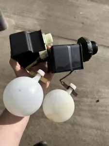 Comparison of old and new float valves used for water tank level control on a pressure washer system. The upgraded float valve provides more reliable water regulation, helping prevent overflows, dry running, and inconsistent water supply issues.